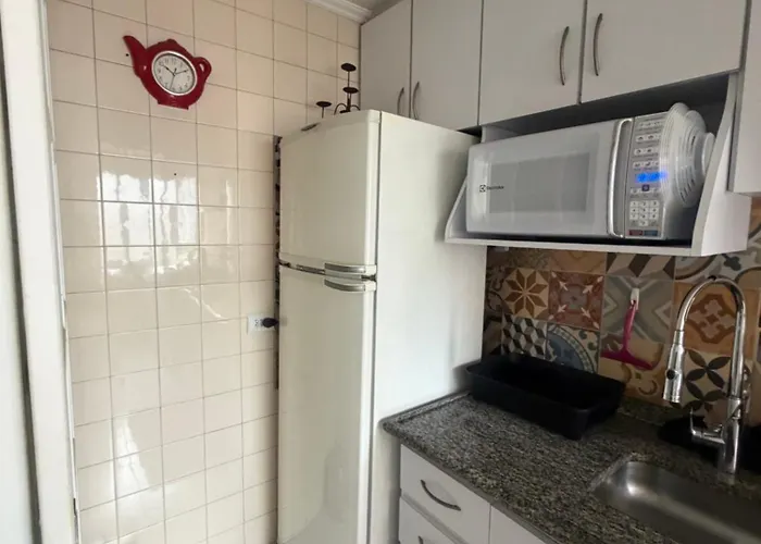 central, novo e com garagem em